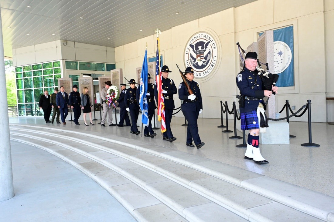 United States Customs and Border Protection Honor Guard marching out to the FLETC Graduates Memorial during ceremony on May 7, 2024, in Glynco, Georgia. (David Tucker/OPA)