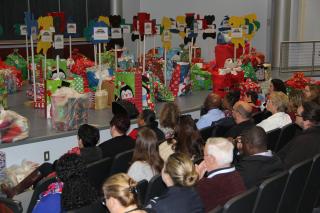 Gifts for CASA children on the stage at FLETC Auditorium, Bldg 912